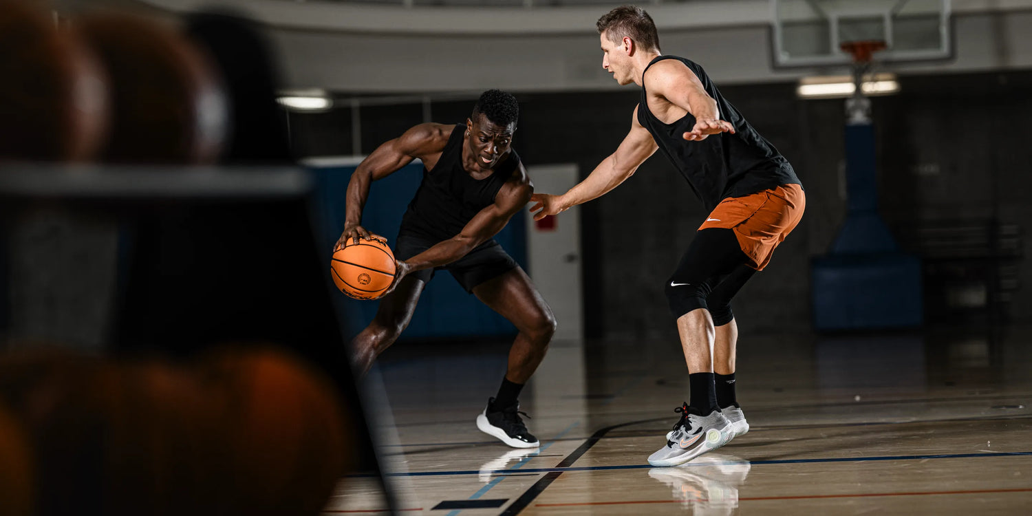 Men playing basketball.