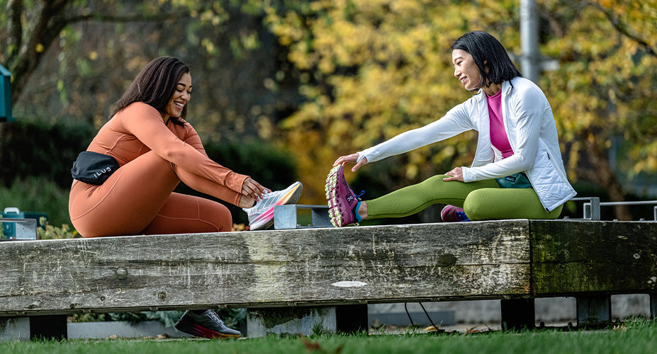 Women stretching as part of a Couch to 5K training plan for beginning runners.
