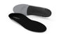Black and gray shoe insoles on a white background